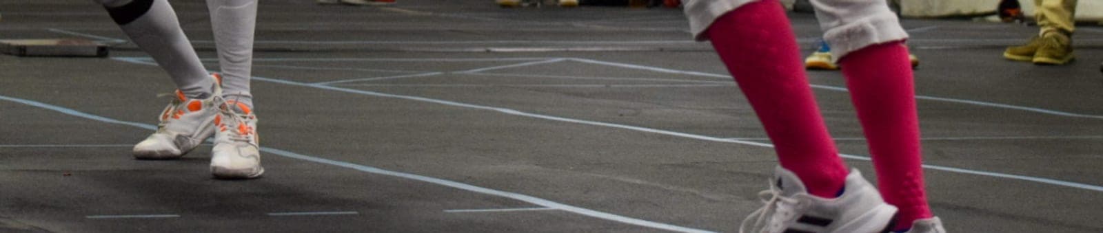 A fencer’s feet on the piste, on the lines